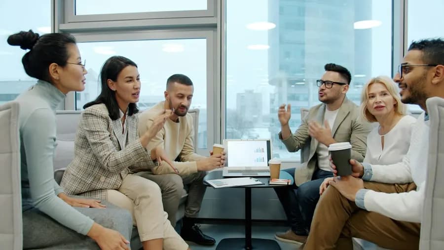 Colleagues in a relaxed office discussion